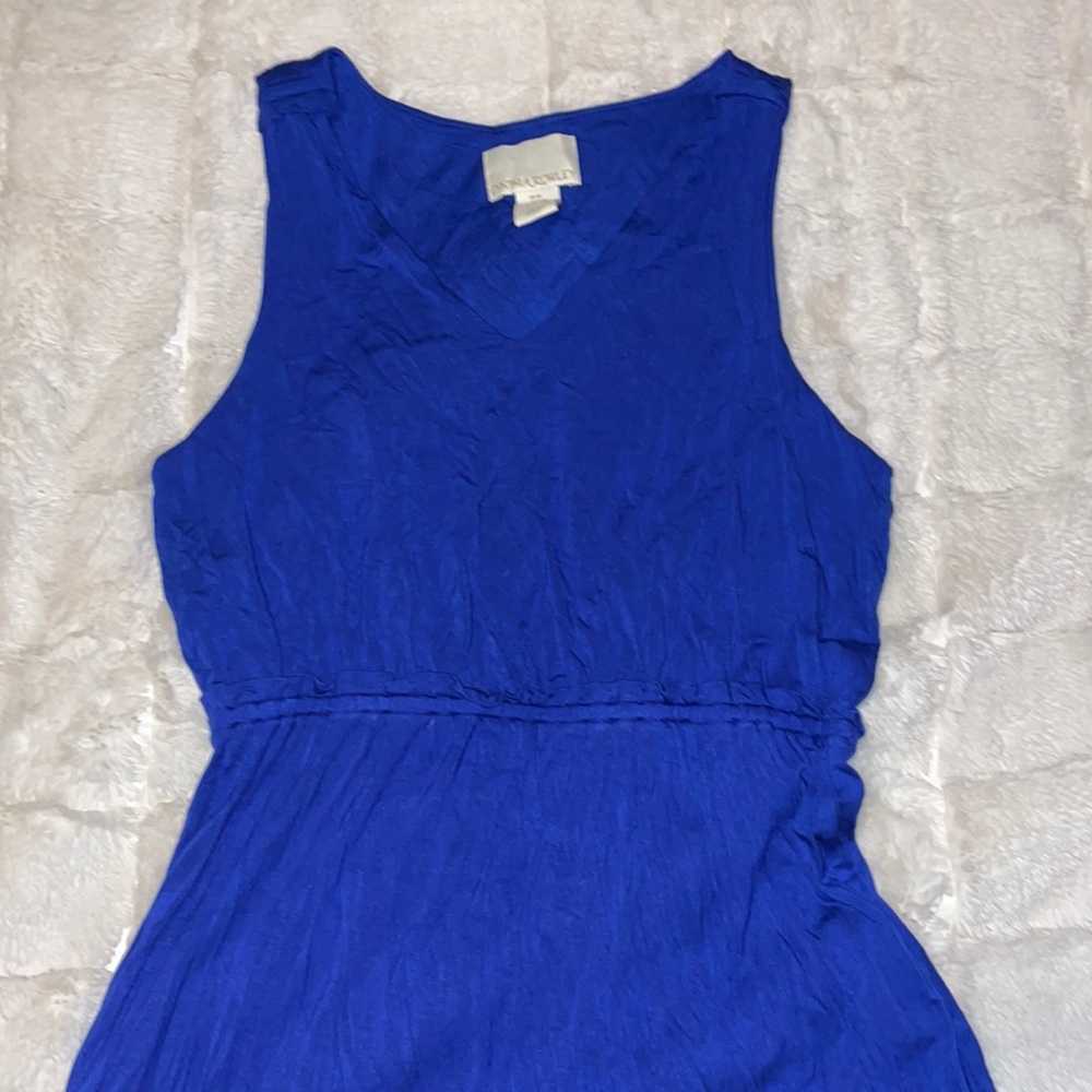 This rich blue dress styles wide tank straps and a v-neck. 95% Rayon; 5% Spandex